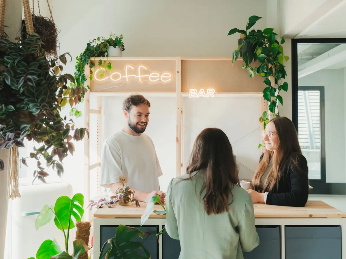 A chat at the coffee bar in the Munich office