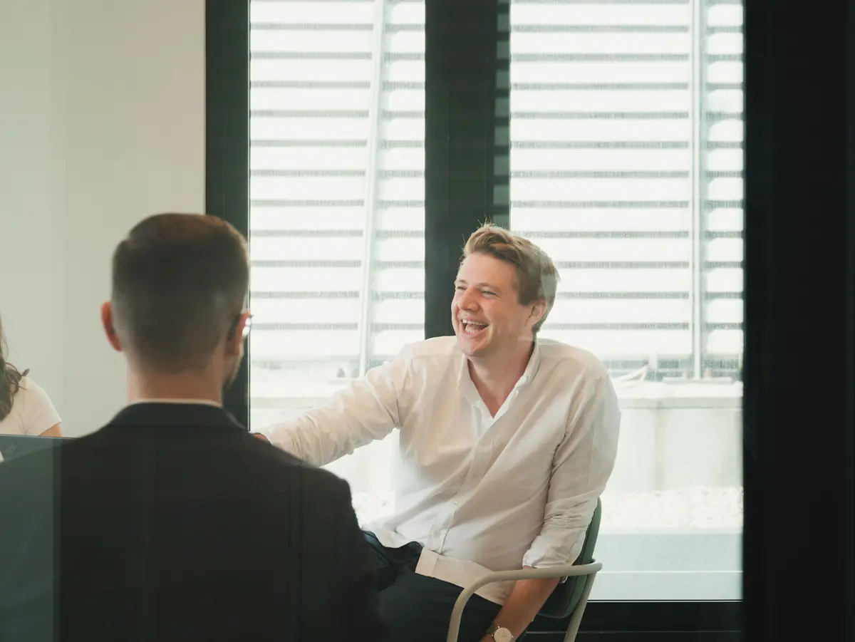 A one-on-one conversation in backlight
